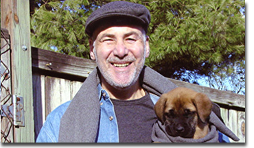 Michael Quattrochi 'Uncle Mikey' is recognized as a pioneer in the field of training young puppies. 