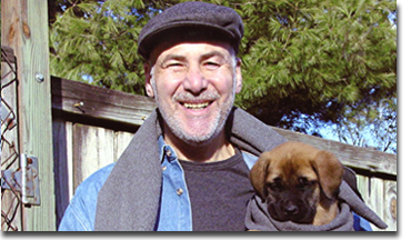 Michael Quattrochi 'Uncle Mikey' is recognized as a pioneer in the field of training young puppies.
